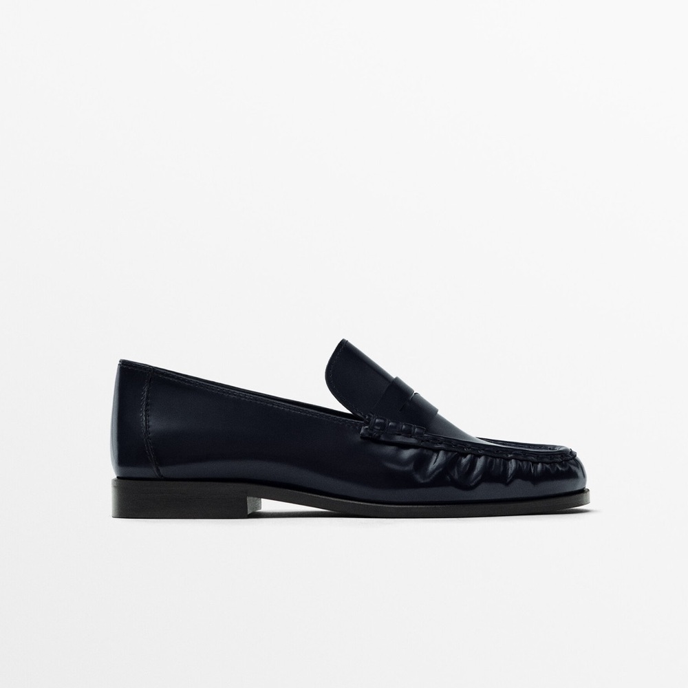 NWT.  NEVER Worn

Massimo Dutti Navy Blue Leather Penny Strap Loafers Size 9.
